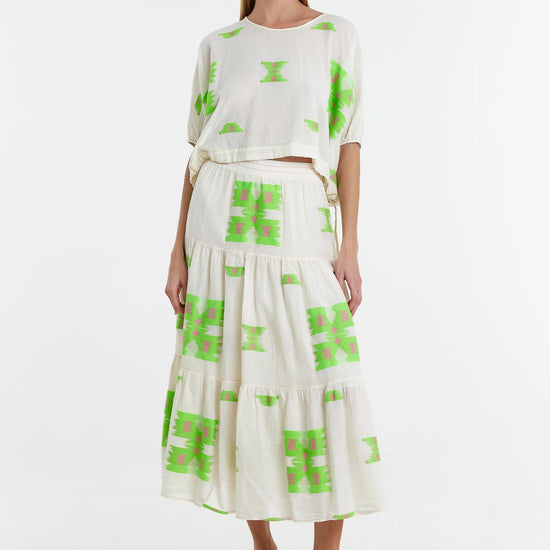 Midaxi skirt in ecru with lime green and pink abstract woven patterns throughout with a double tier and lining to the knee