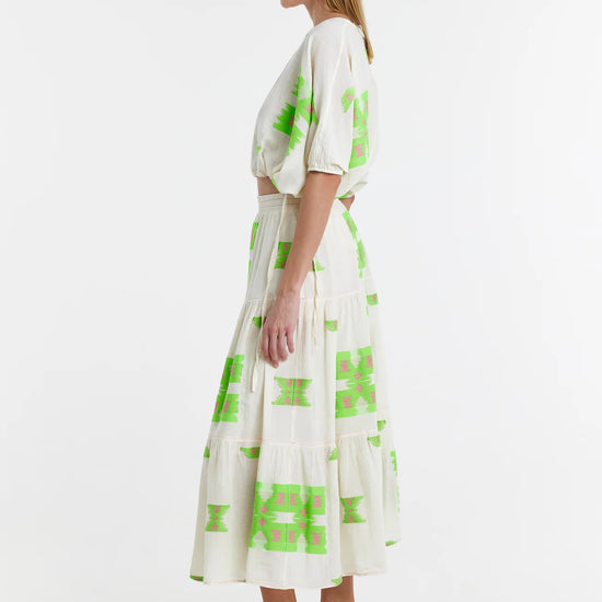 Midaxi skirt in ecru with lime green and pink abstract woven patterns throughout with a double tier and lining to the knee