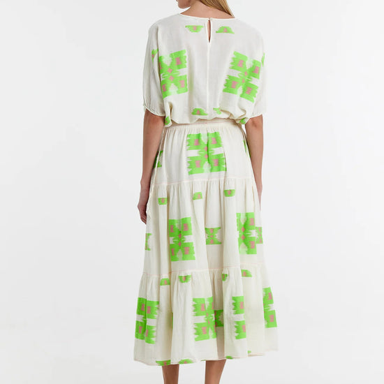 Midaxi skirt in ecru with lime green and pink abstract woven patterns throughout with a double tier and lining to the knee