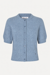 flat lay of a blue cardigan short sleeved with a plain white background 