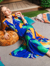 Blue orange and green print midi dress with deep V neck and empire line with deep frill hem