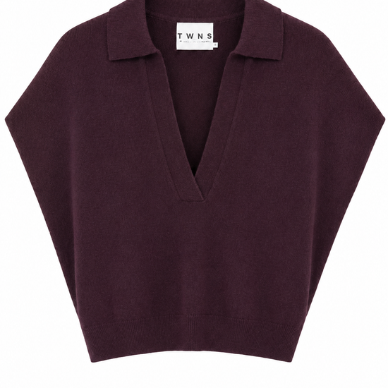 flat lay of a purple v neck knit with cap sleeves on a white background. with a collar and an open v neckline 