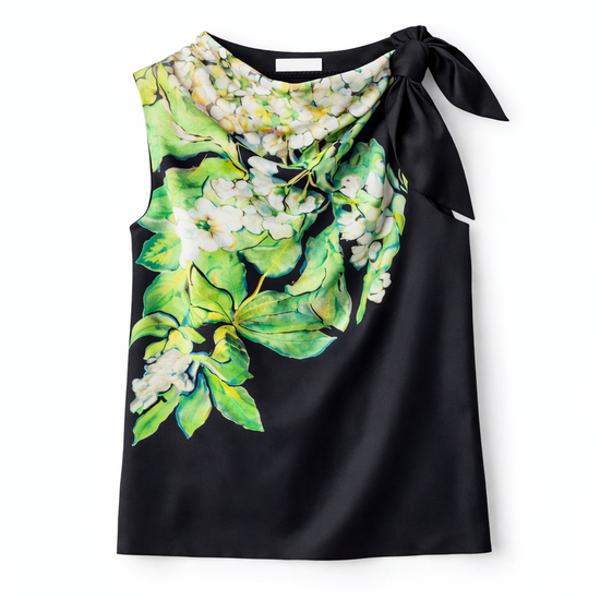 Black silk sleeveless top with floral design on a white background