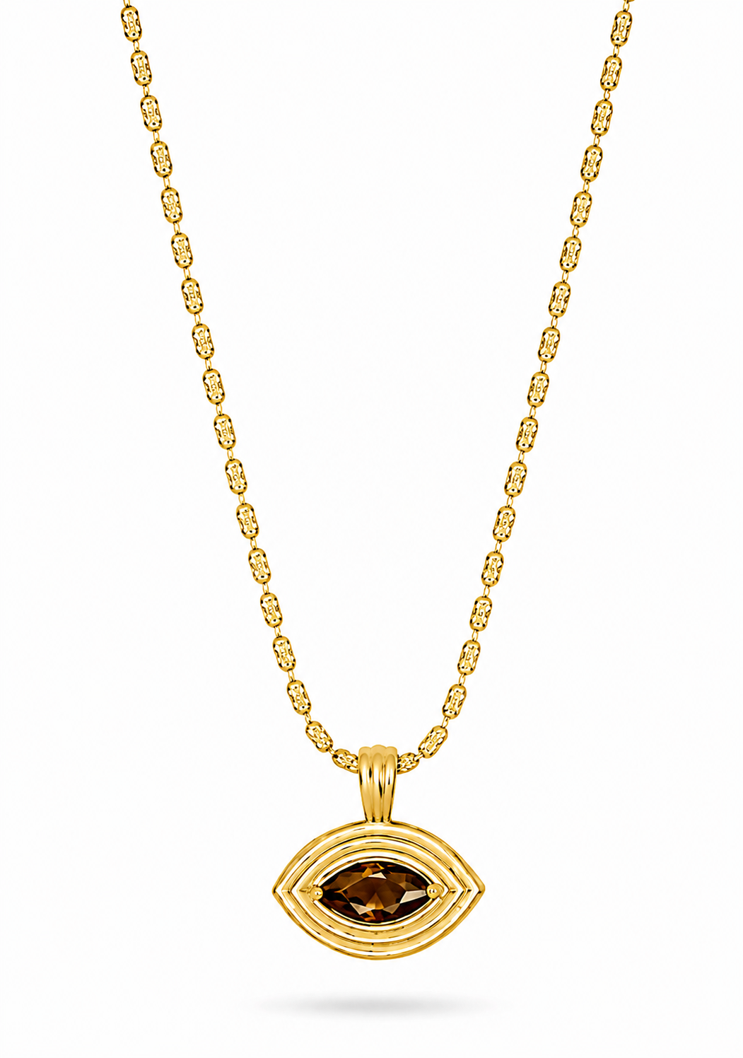 flat lay of a gold necklace with an evil eye pendant with a brown tigers eye stone on the pendant 