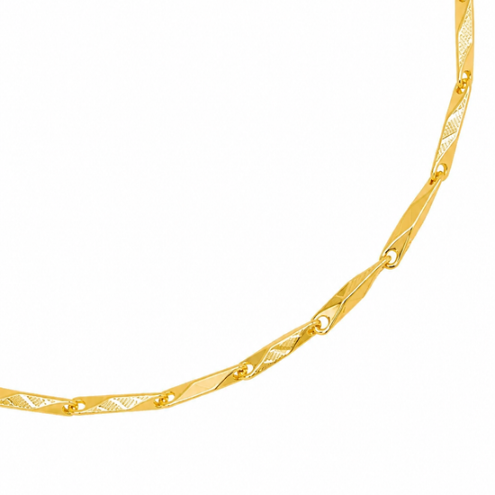 A close-up of a gold chain necklace with a textured, diamond-patterned center and small raised gold dots along the edges, shown against a plain white background.