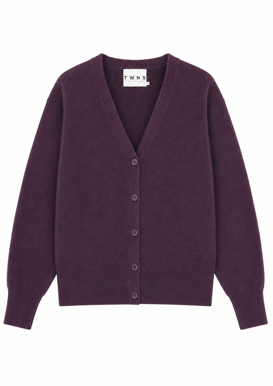 A dark purple V-neck cardigan sweater with a button-up front, shown flat against a plain white background. The brand label 'TWNS' is visible inside the collar.
