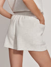 Double soft ivory marl shorts with relaxed side pockets rear view