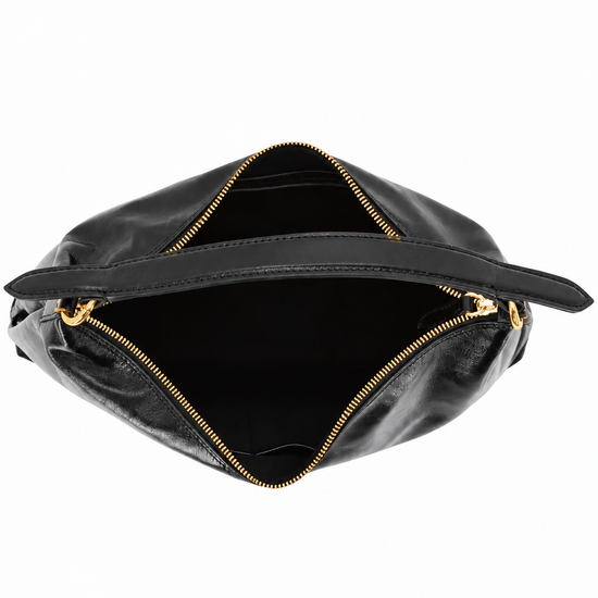 A black leather slouchy hobo handbag with gold-tone hardware and a single shoulder strap, photographed against a plain white background.
