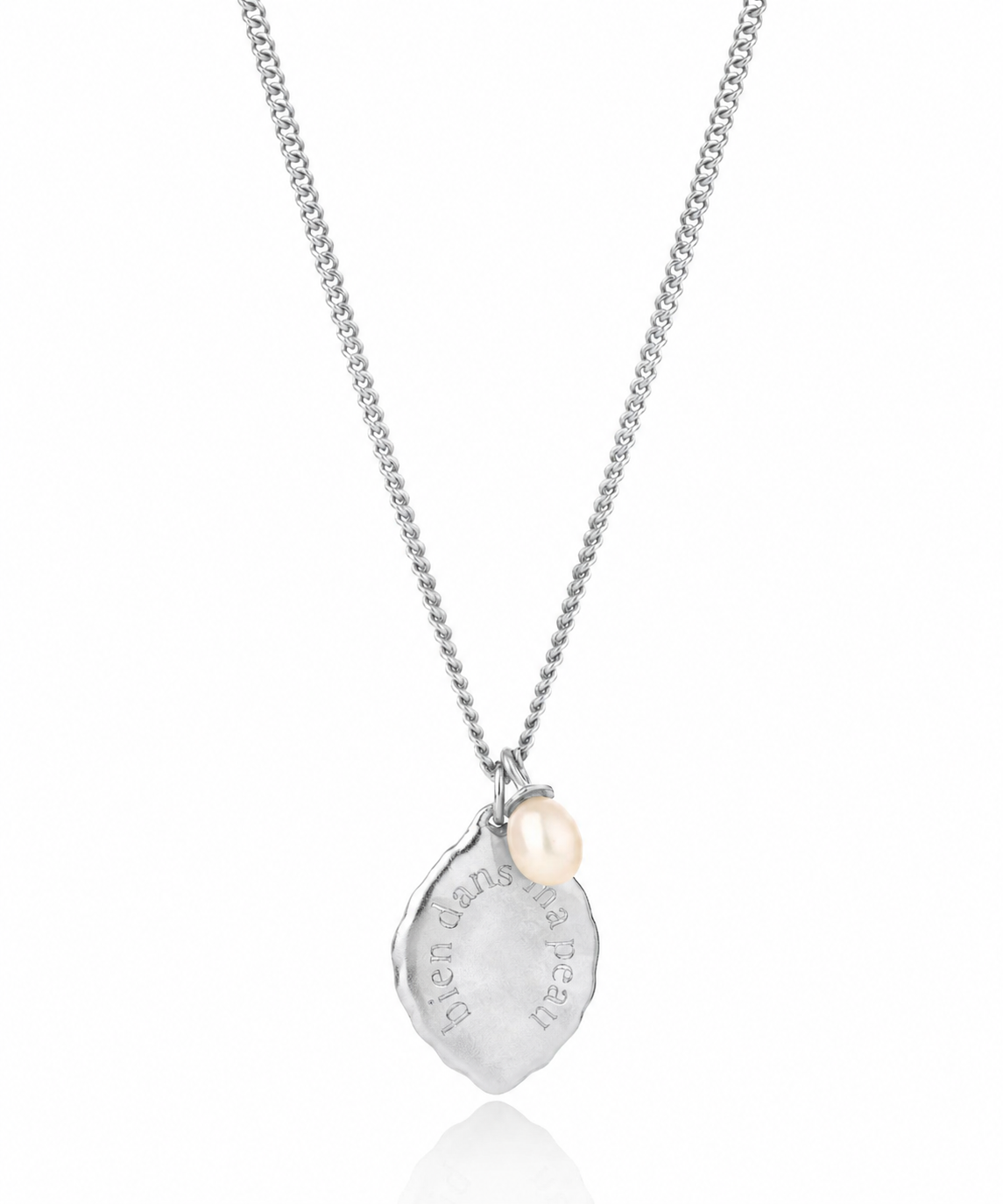 Silver necklace with a teardrop-shaped pendant on a white background