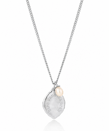 Silver necklace with a teardrop-shaped pendant on a white background