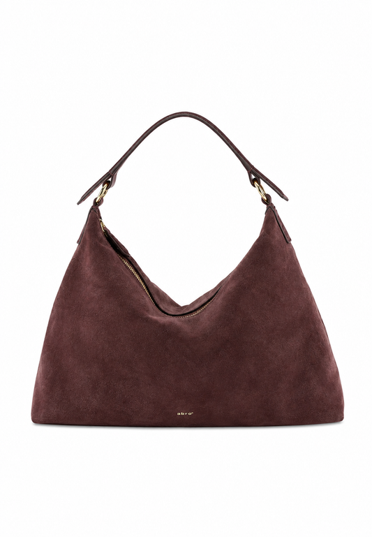 A dark brown suede hobo shoulder bag with a single leather strap and gold-tone hardware, shown against a plain white background.