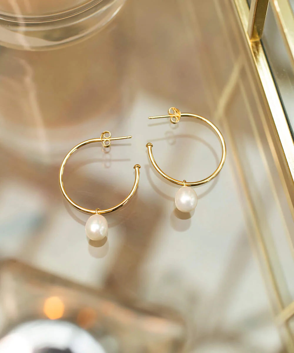 Gold hoop with pearl drop charm