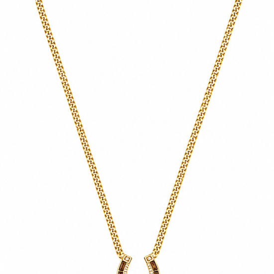 A gold chain necklace with a horseshoe-shaped pendant, displayed on a clean white background.