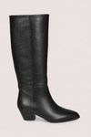 A single black leather knee-high boot with a low block heel and pointed toe, shown in profile against a light beige background.