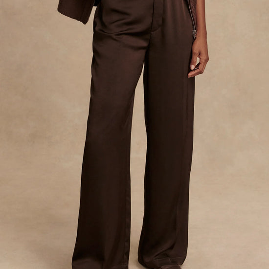 wide leg elasticated waist chocolate brown sateen trousers model shot