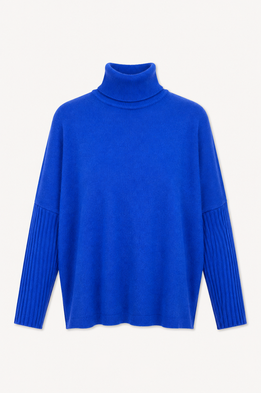 flat lay image of a bright blue roll neck on a white background 