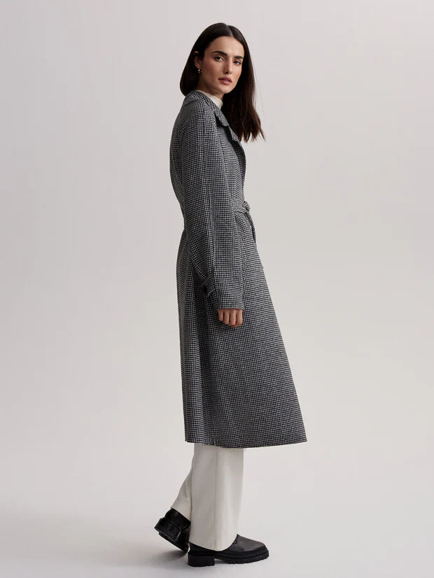 black houndstooth coat with tie belt side view 