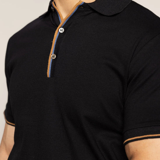 black polo shirt with contrast colour  close up