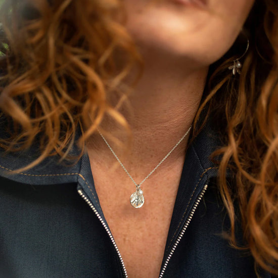 Silver bee coin pendant necklace with small rice pearl on silver chain