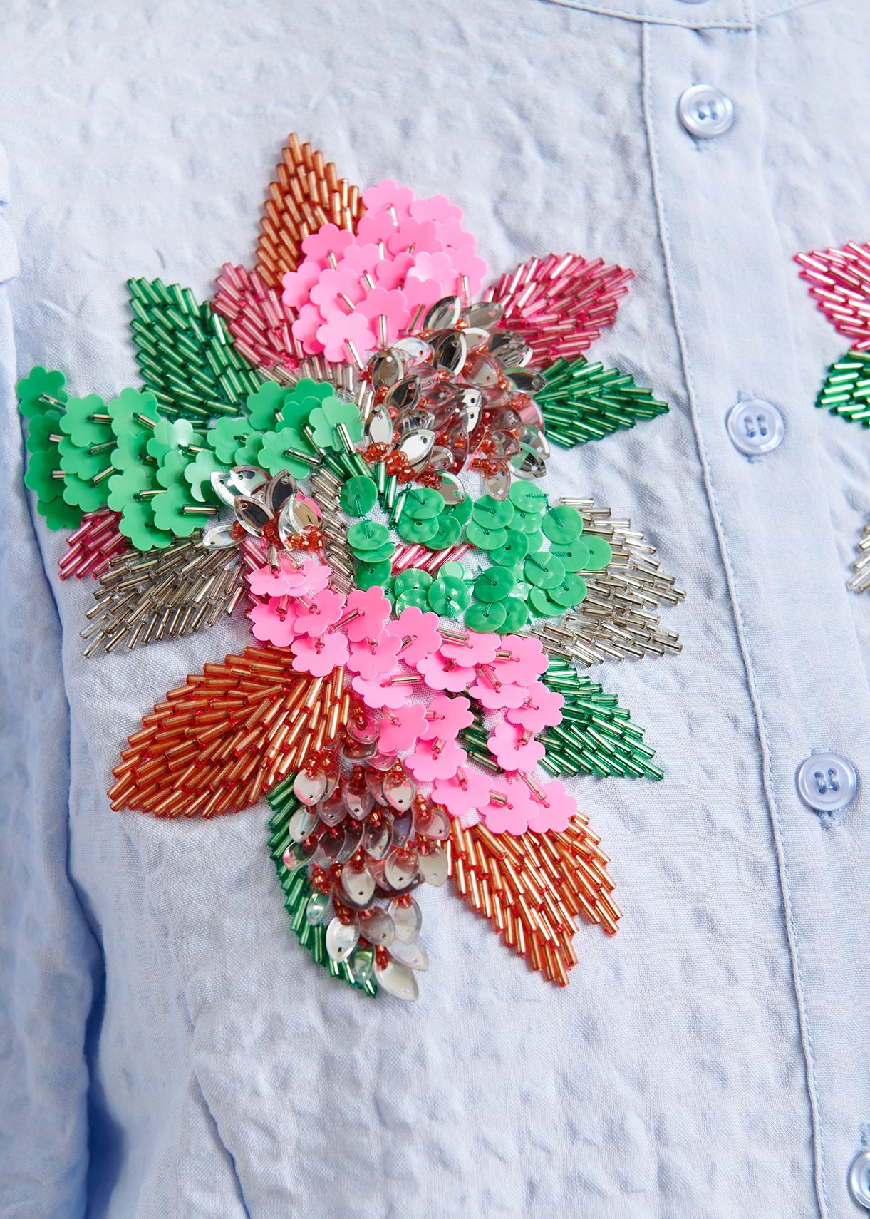 Embroidered floral design on an Essentiel Antwerp shirt close up