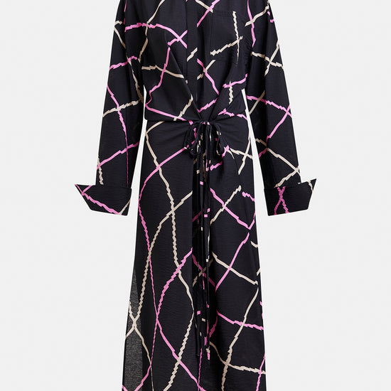 Black checkered shirt dress with tie detail by Essentiel Antwerp on a white background
