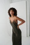 khaki silk mid length slip dress with spaghetti straps and lace detailing close up