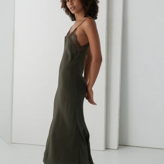 khaki silk mid length slip dress with spaghetti straps and lace detailing side view