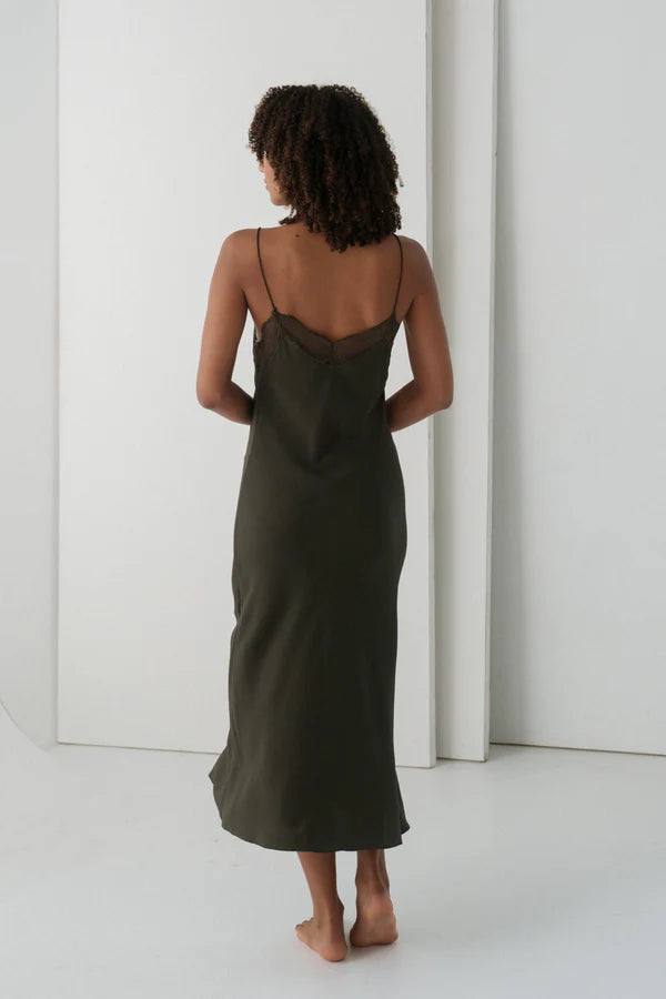 khaki silk mid length slip dress with spaghetti straps and lace detailing rear view