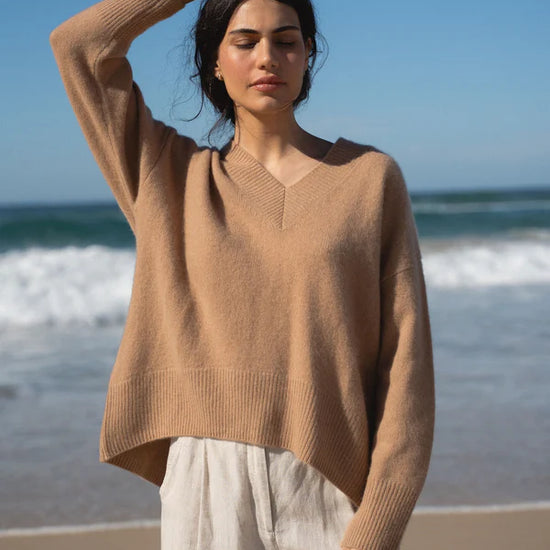camel cashmere v neck jumper with ribbed neck, cuffs and hem