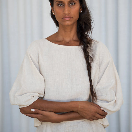 Woman wearing a white outfit against a light background from Lilly Pilly