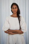 Woman wearing a white outfit against a light background from Lilly Pilly