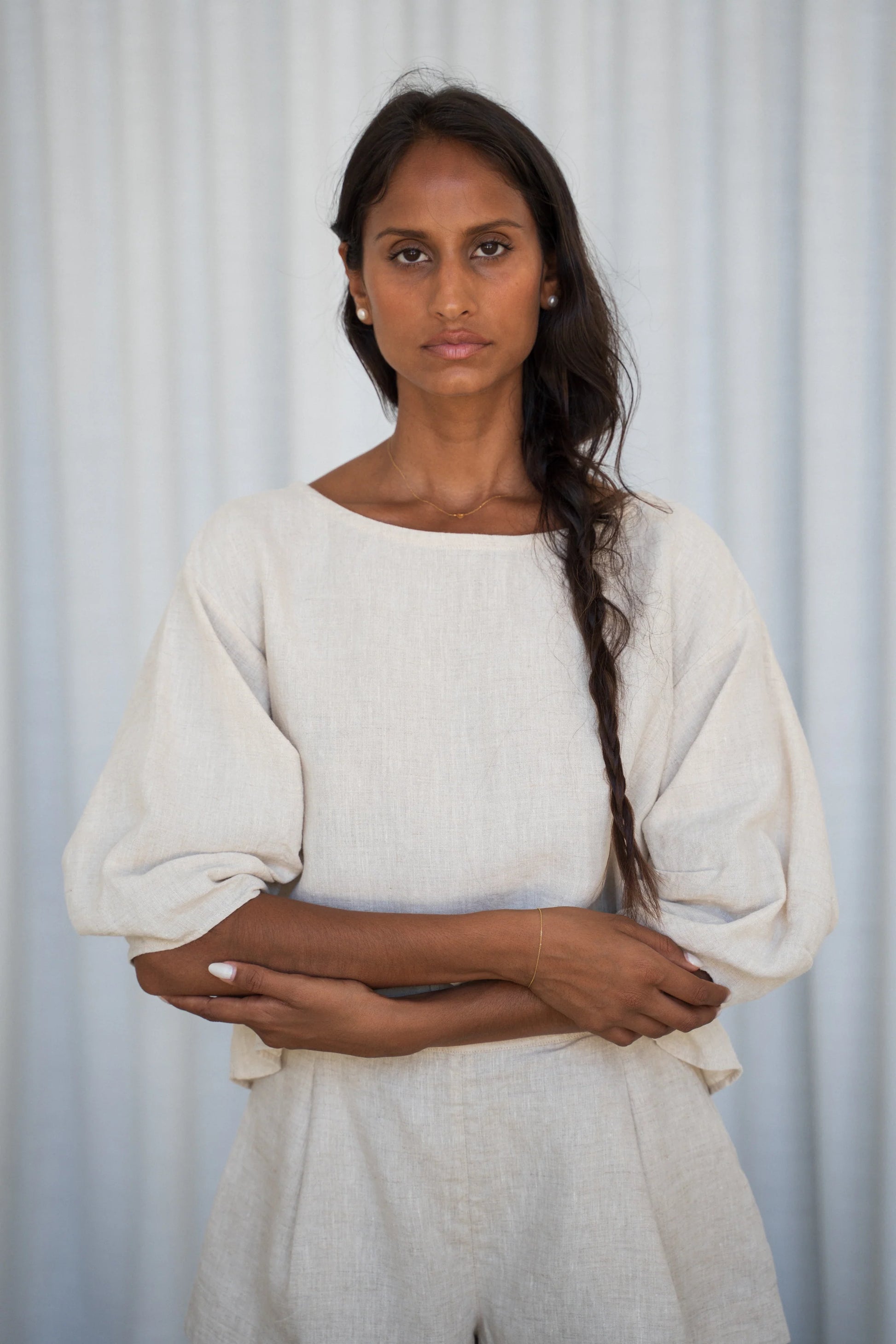 Woman wearing a white outfit against a light background from Lilly Pilly