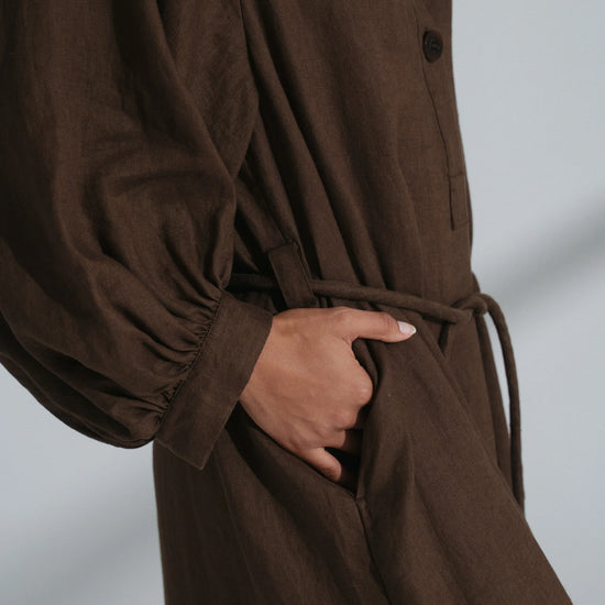 Brown dress with a plain background