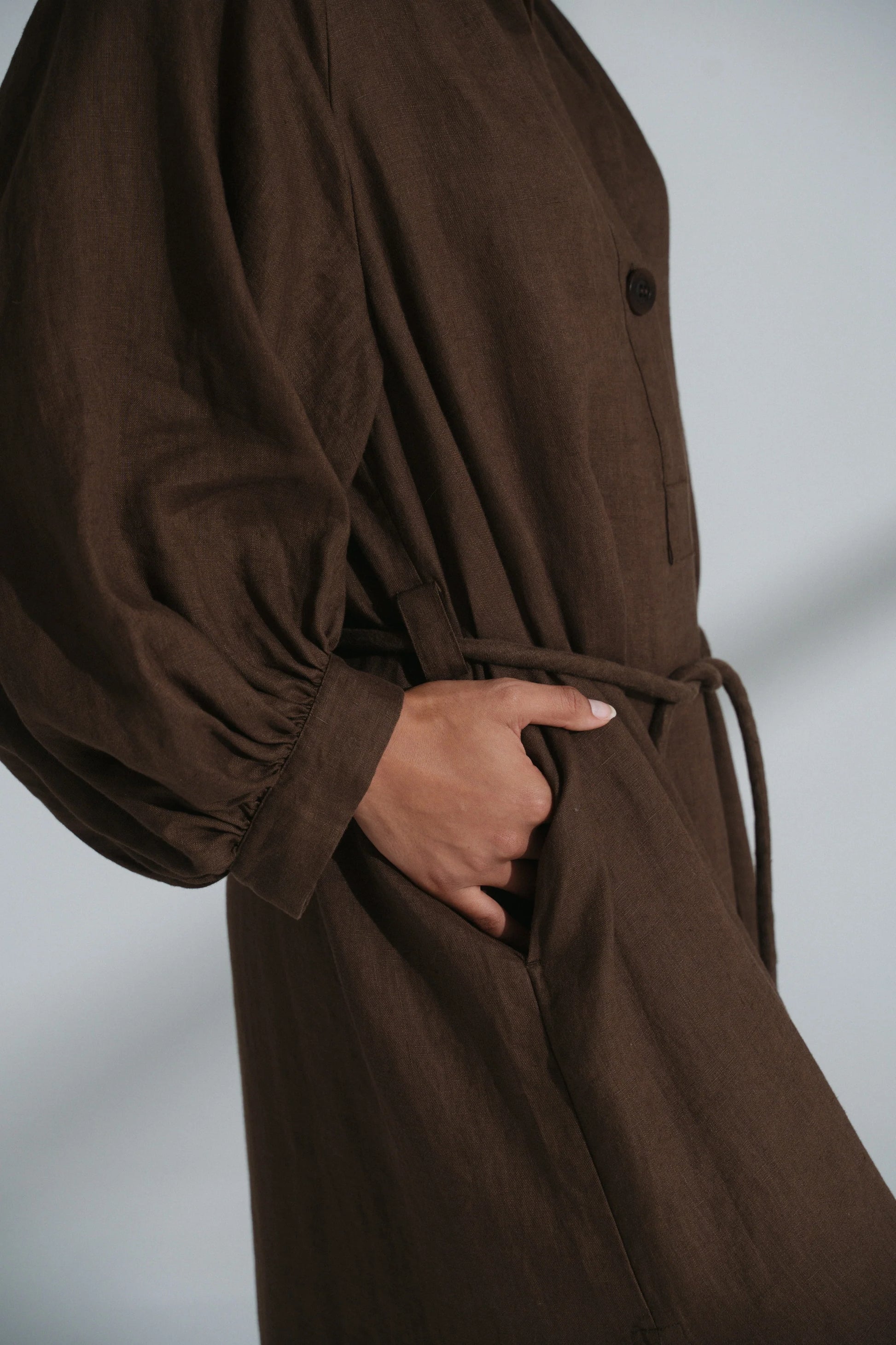 Brown dress with a plain background