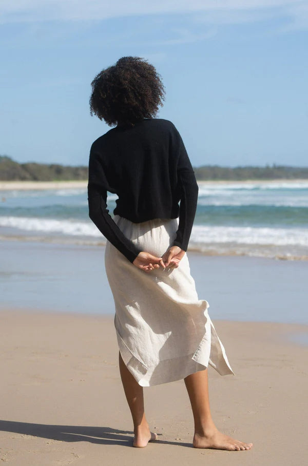 black cashmere jumper with round neck and ribbed sleeves  rear view 