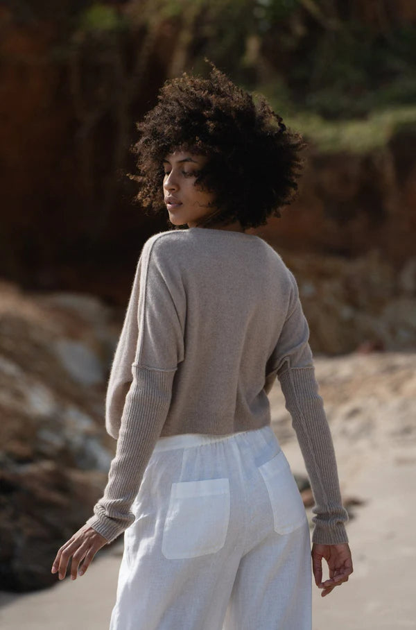 oatmeal cashmere jumper with round neck and ribbed sleeves  rear view 