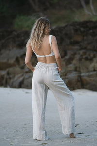 Wide leg organic linen trousers in a soft oatmeal colour