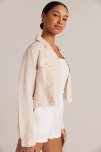 Raw hem crop jacket with patch pockets in linen blend fabrication