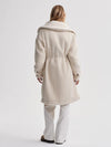 cream sherpa coat with high neck, 2 large patch pockets and drawstring waist rear view 