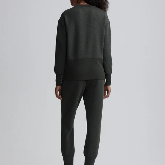 dark green sweater with round neck and zip detail rear view 