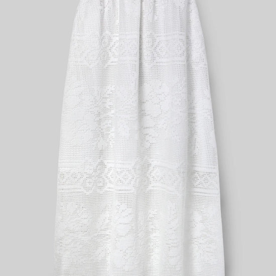 White lace skirt by Beaumonet Organic on a gray background