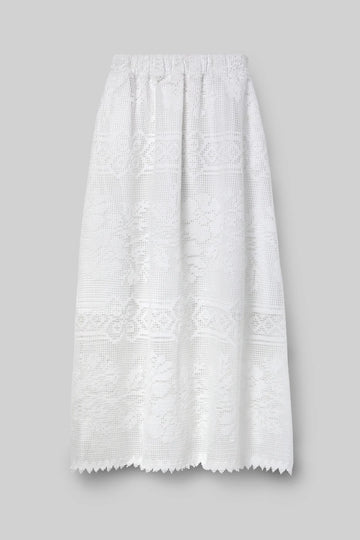 White lace skirt by Beaumonet Organic on a gray background