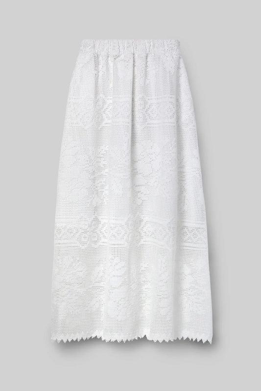 White lace skirt by Beaumonet Organic on a gray background