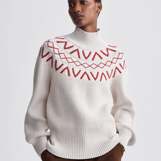 white turtleneck jumper with red fairisle print model shot