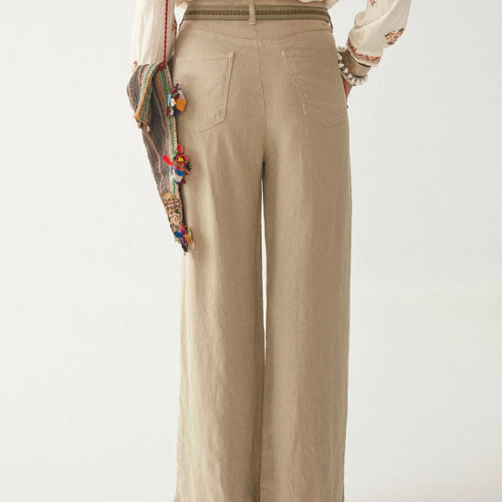 Light khaki wide leg linen trousers with pleated front zip fly and button fastening