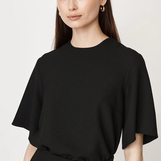 Black short fluted sleeved shell top with back zip fastening