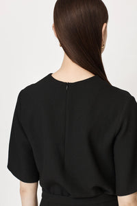 Black short fluted sleeved shell top with back zip fastening