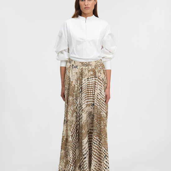 silk beige irregular polka dot print skirt with pockets and elasticated waist model shot