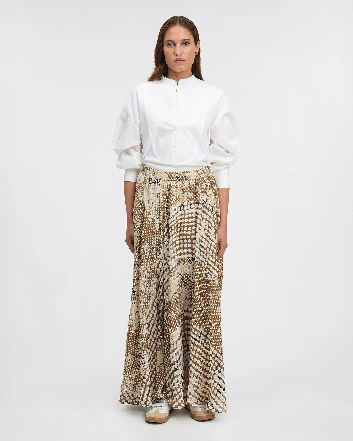 silk beige irregular polka dot print skirt with pockets and elasticated waist model shot