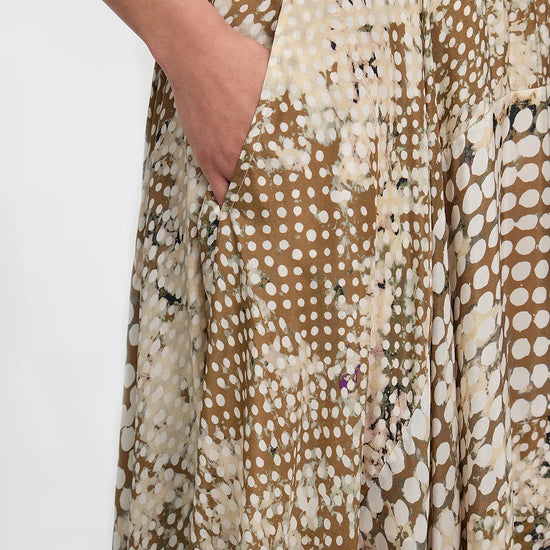 silk beige irregular polka dot print skirt with pockets and elasticated waist close up of pocket